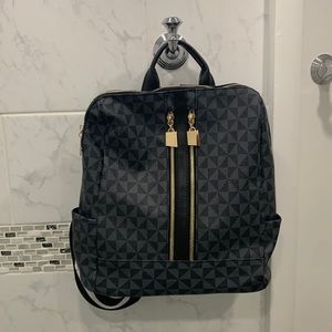 New! Purse/backpack in black and grey print